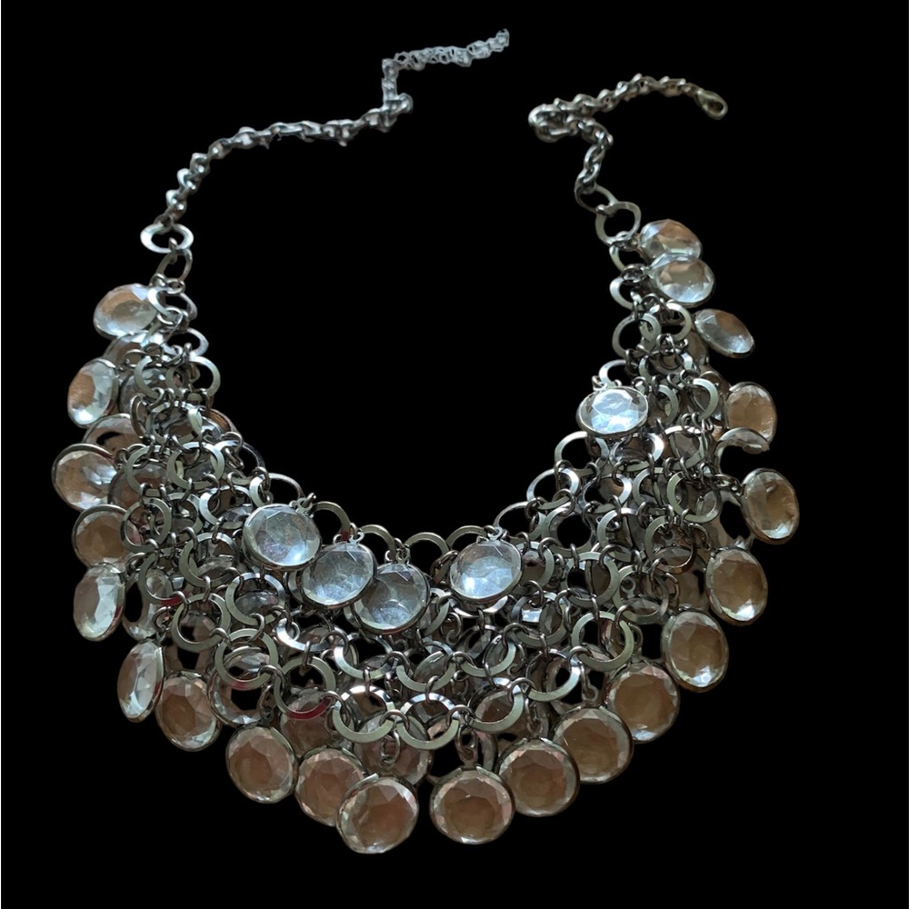 Blackened chain with clear crystal.